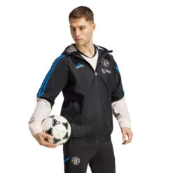 Chaqueta Adidas Manchester United FC Fanswear 2022-2023 11 Chaqueta Adidas Manchester United FC Fanswear 2022-2023 -ADIDAS Ventas chaqueta adidas manchester united fc fanswear 2022 2023 black icey pink 3